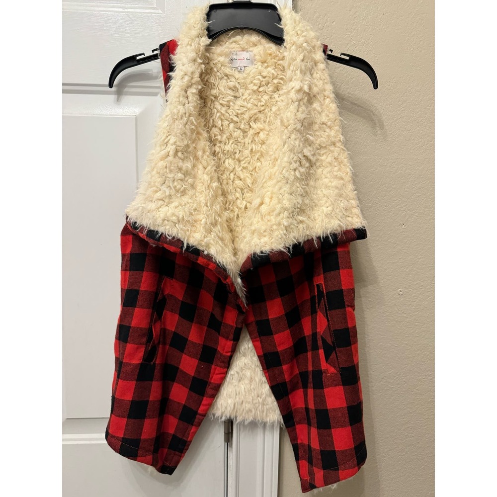 ‎Vest